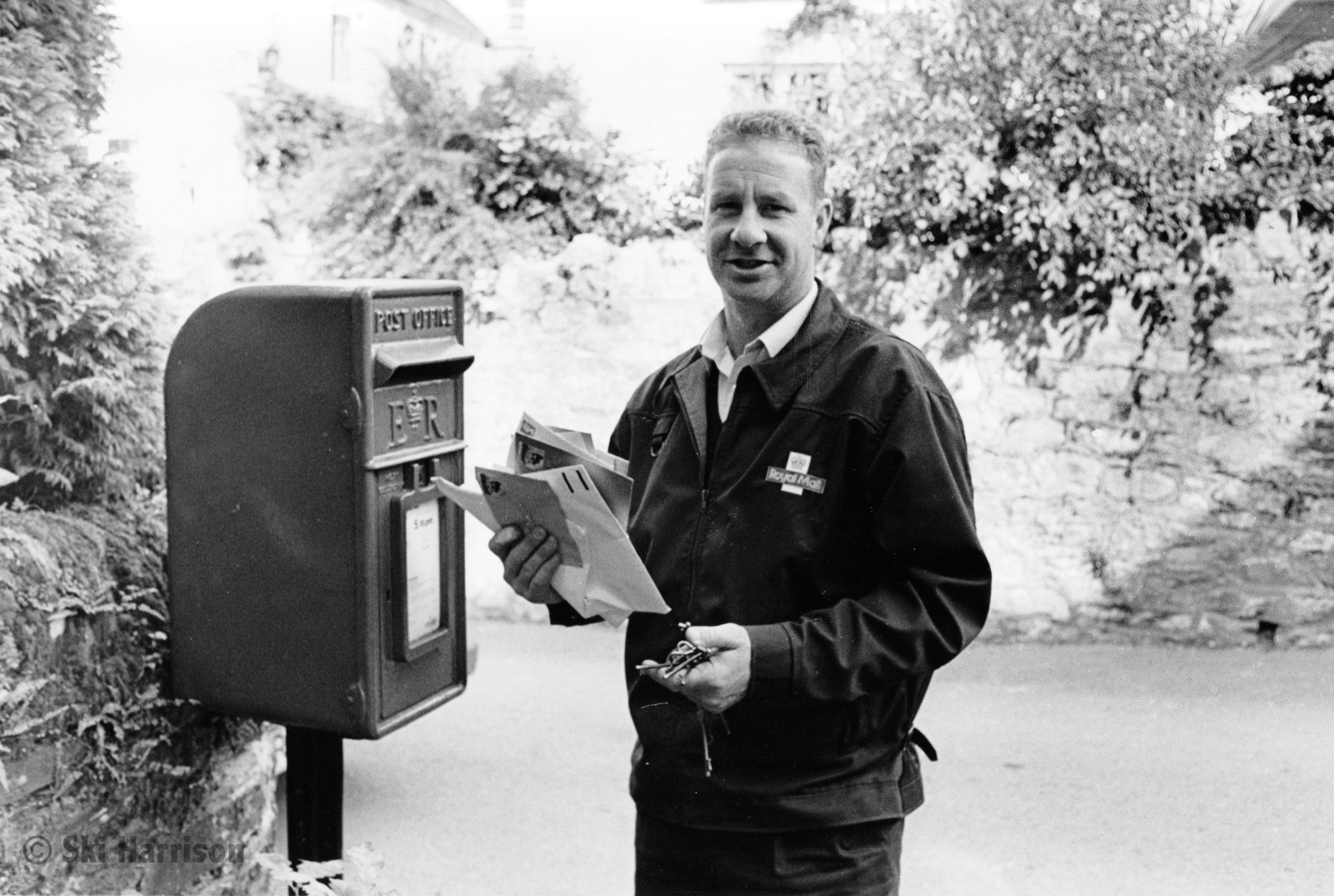 CS01 - Nigel the postman emptying the post box. Cornworthy, 2000