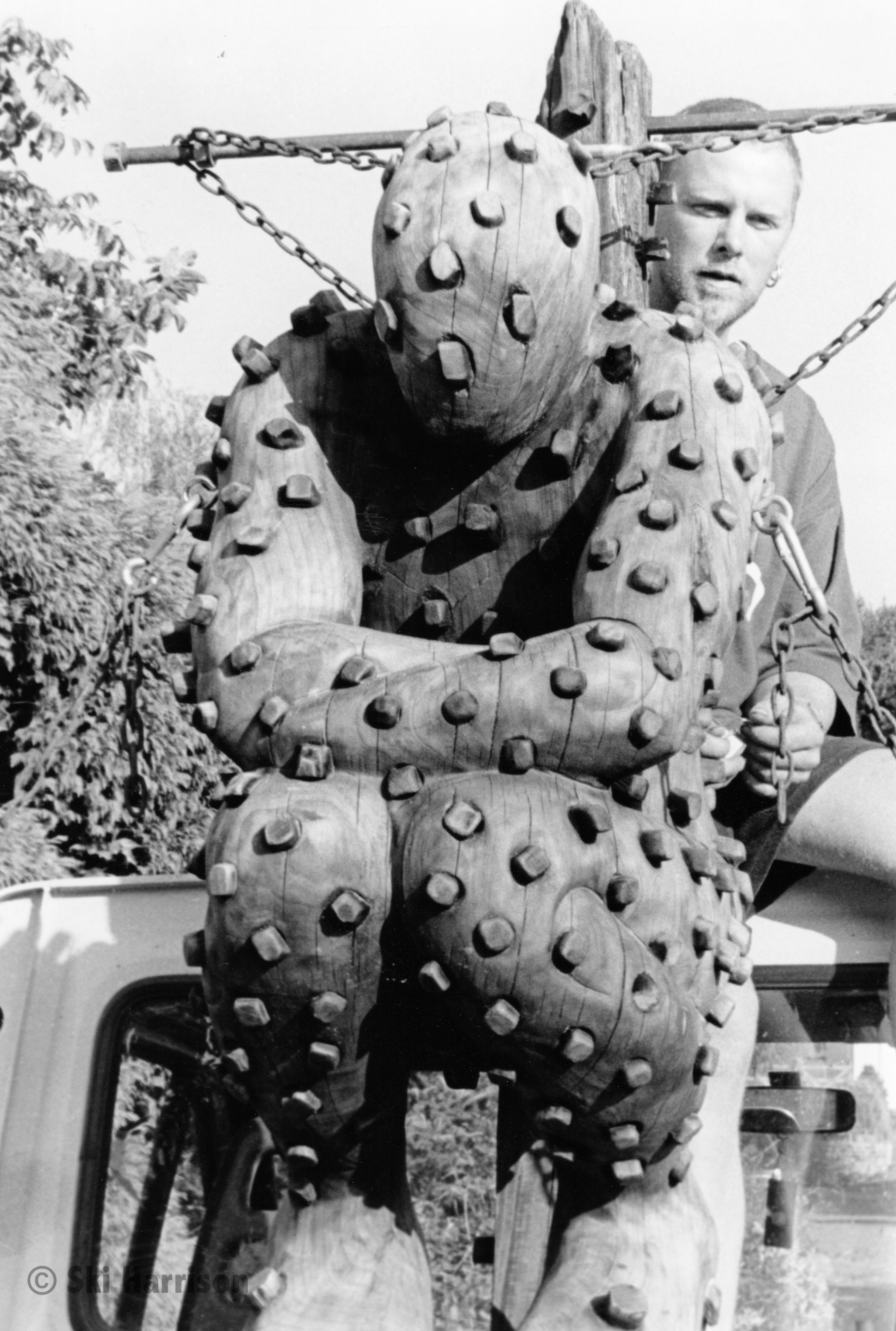 CS11 - Mic Chambers with one of his sculptures. Cornworthy village, 1999