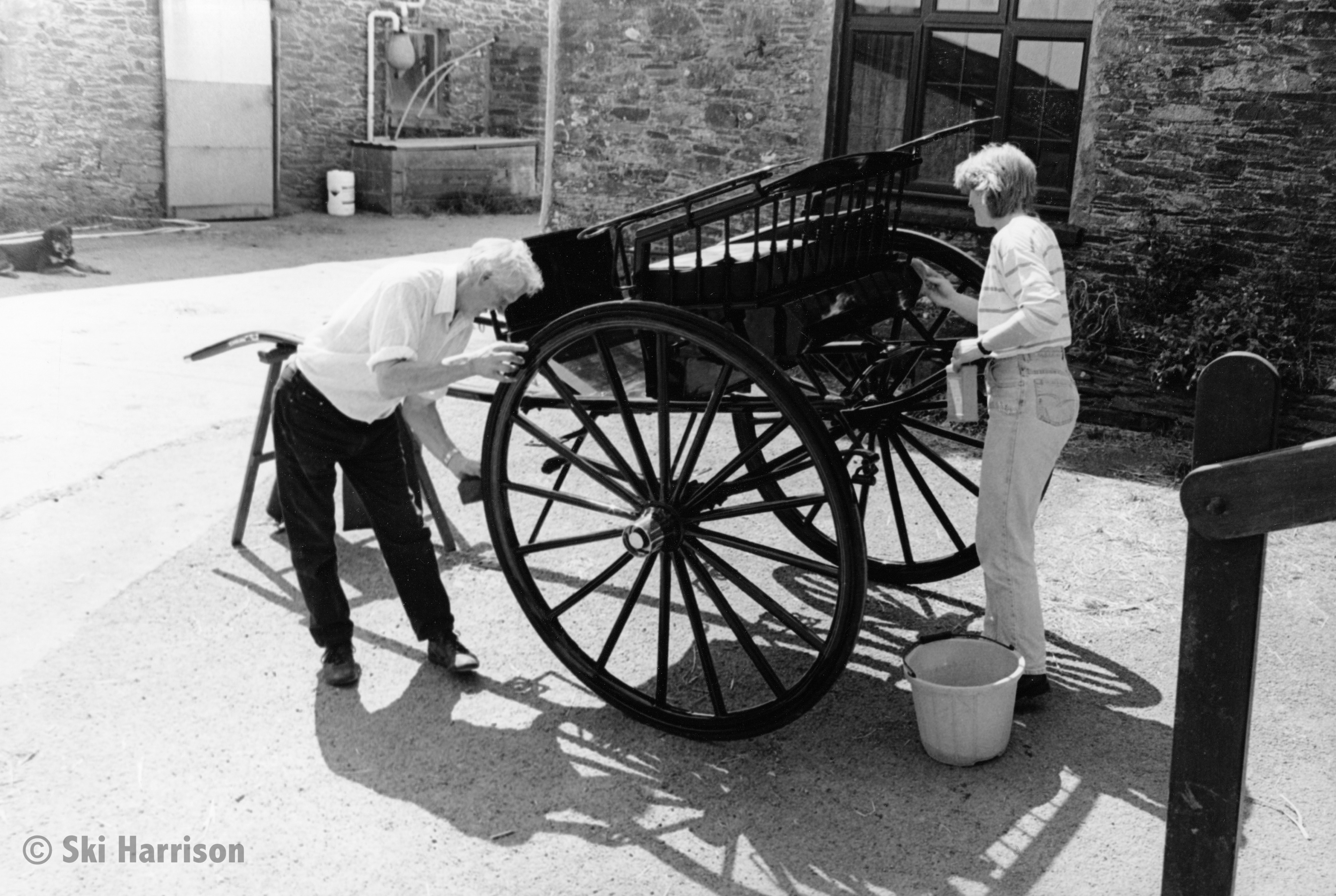 CS39 - Dave and Rita Folland cleaning their 1896 Gig which was made at Lockerbie. 1999