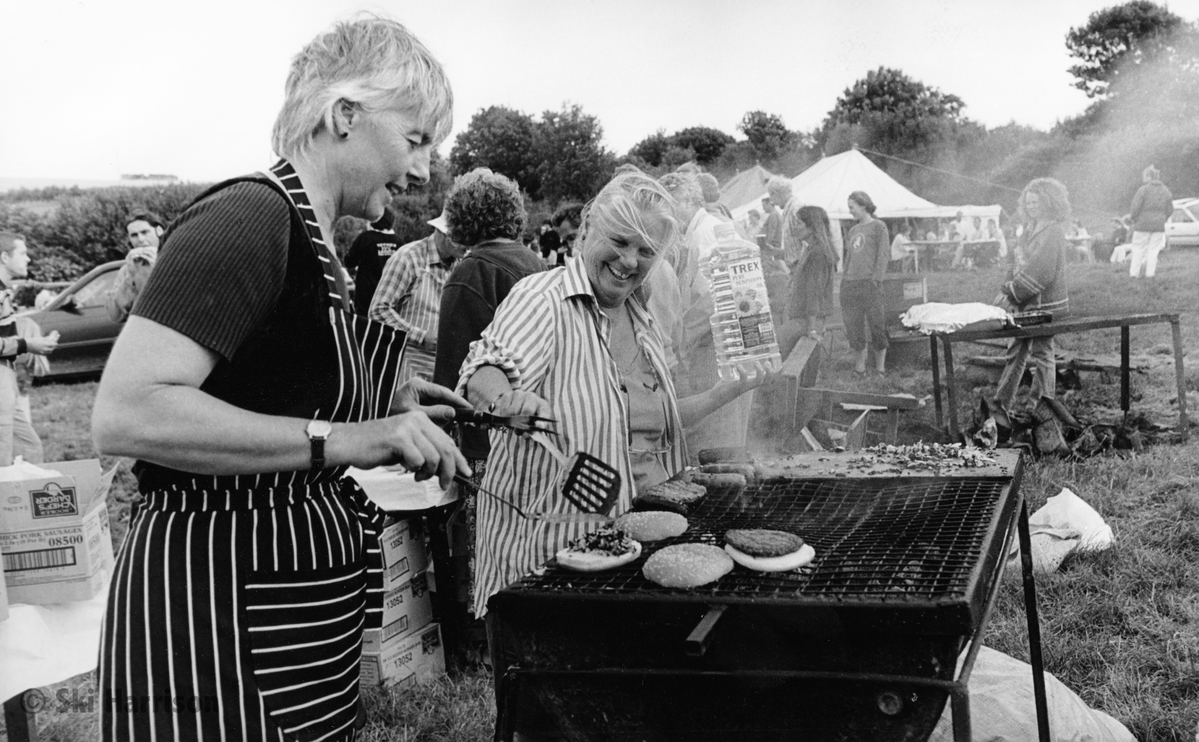 CS46 - L-R Anna Pearce and Joanie Appleton cooking beefburgers. Cornworthy Pig Roast, 2000