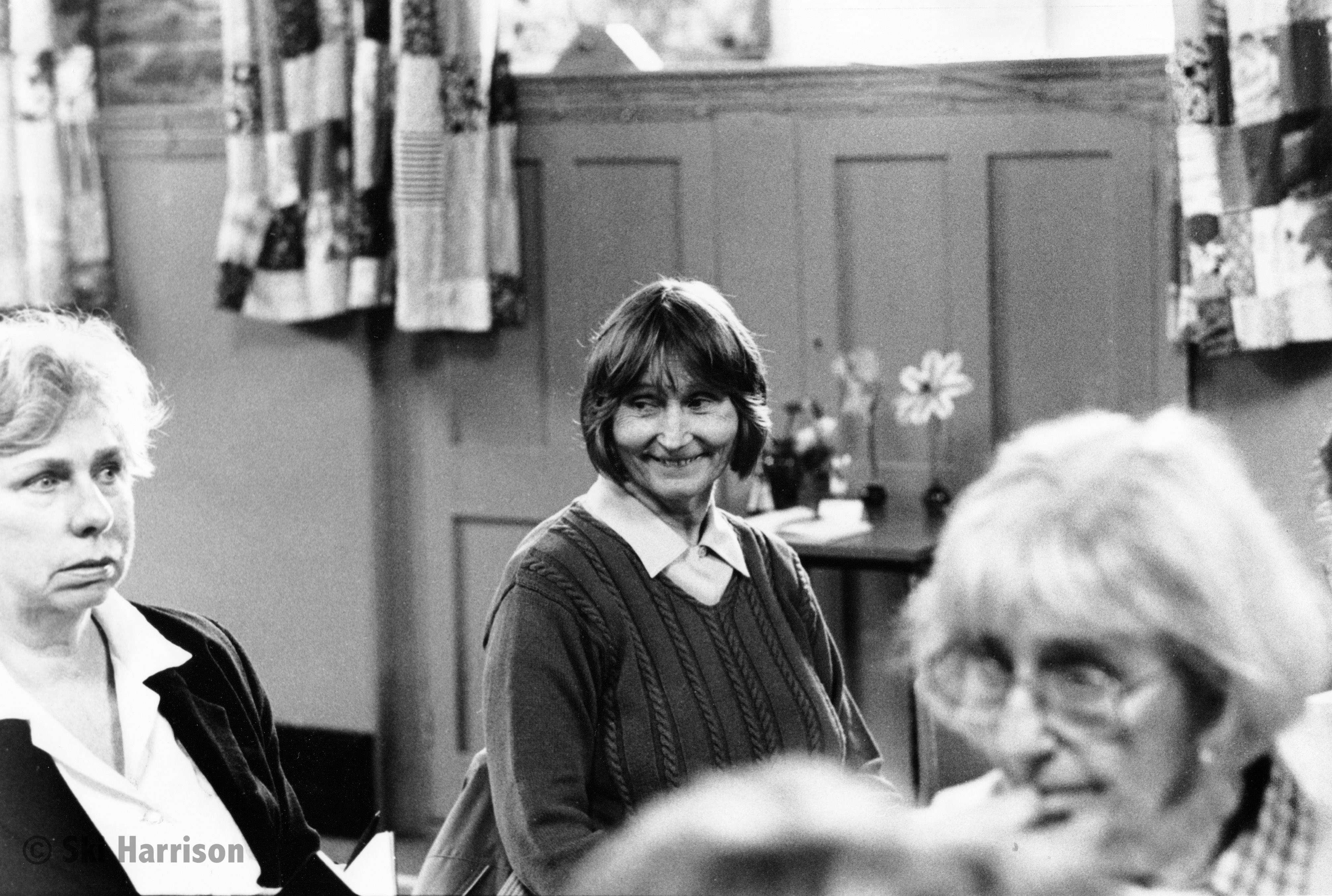 CS62 - Wl Meeting. L-R Jenny Bradley, Veronica Bridges and Joyce Barker. Bloom of the Month competition in the background. Cornworthy Village Hall, 2000