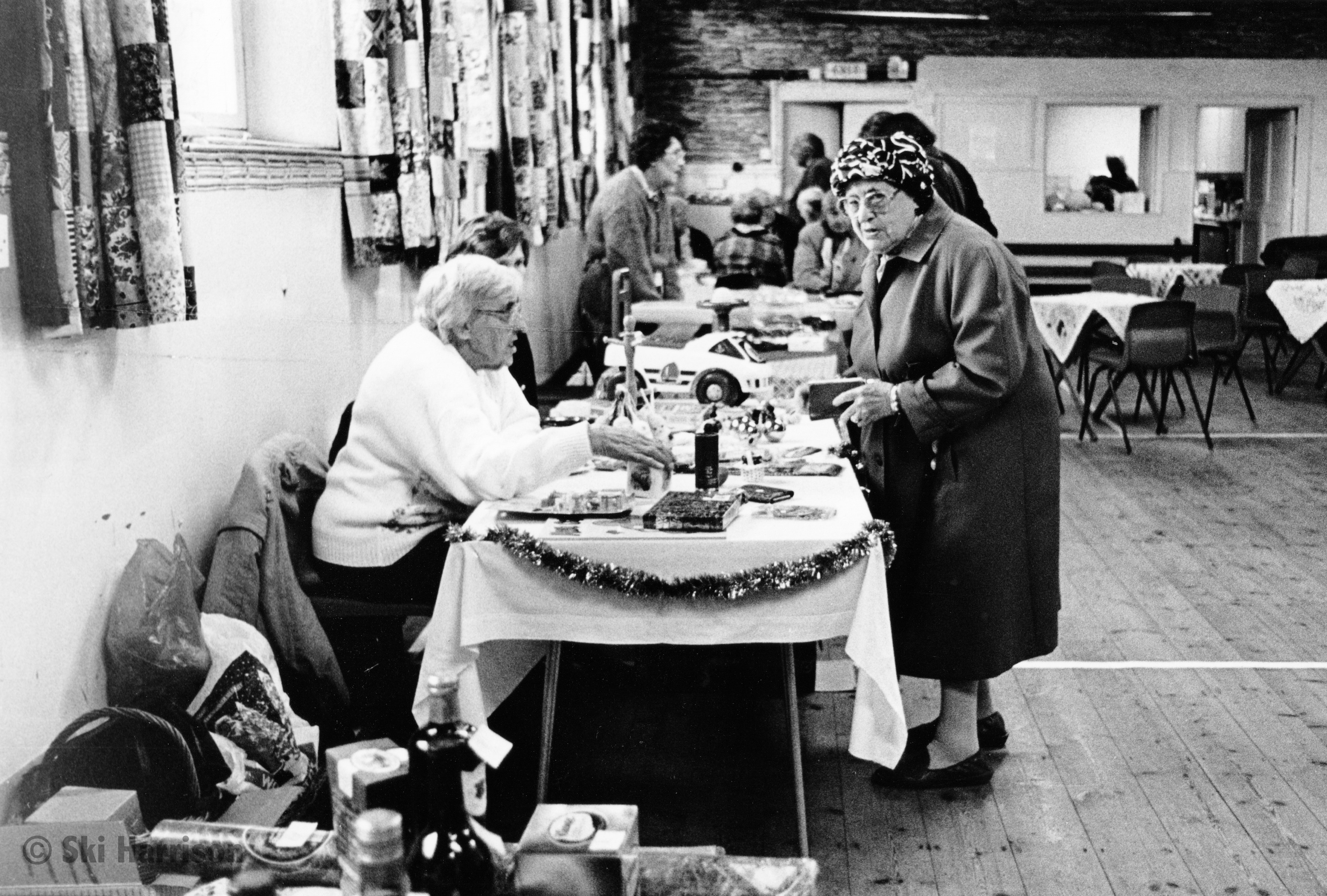CS64 - Methodist Church Bazaar. Freda Pyne running the children's stall. Cornworthy Village Hall,1997
