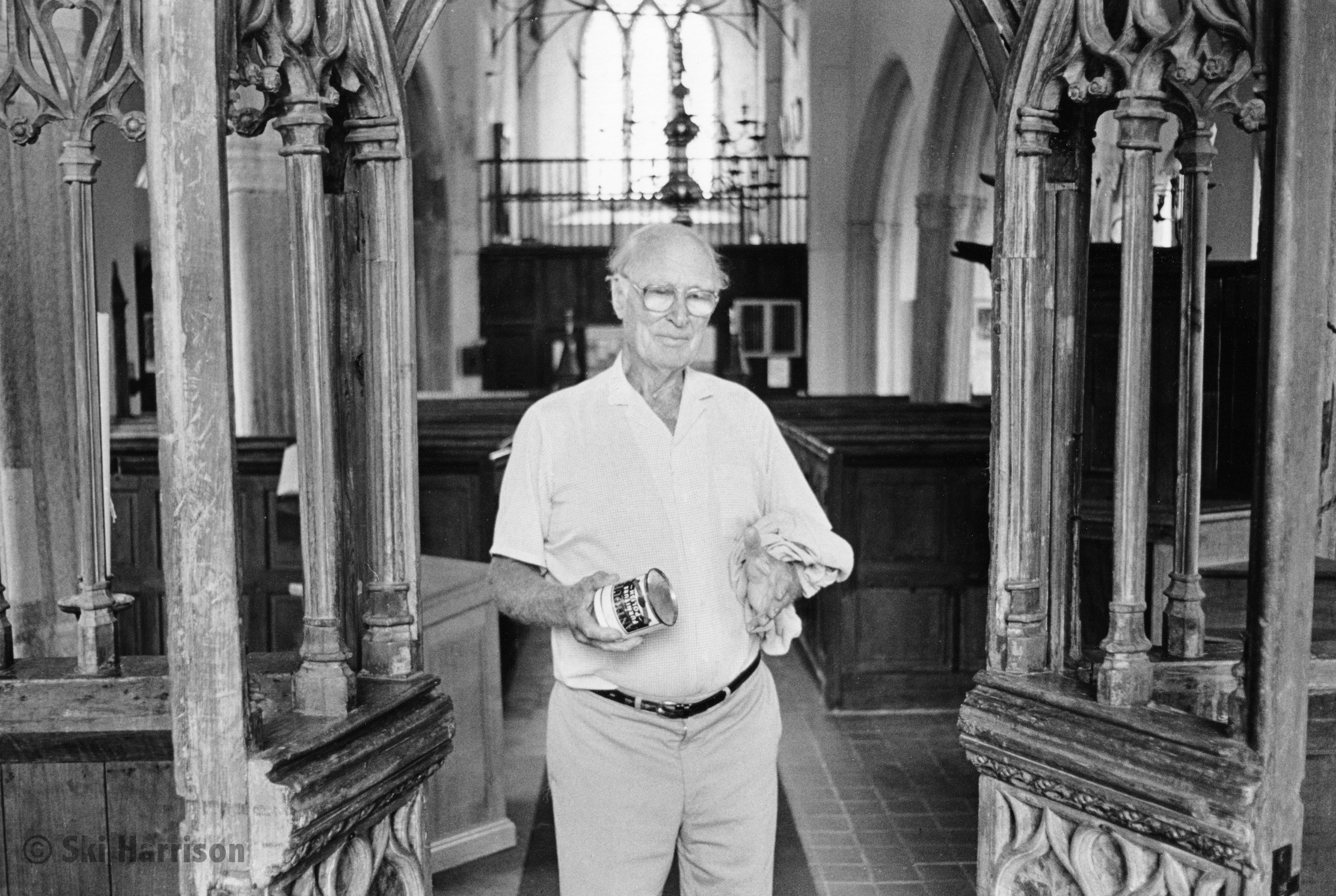 CS82 - Roly Richardson polishing the lectern. Cornworthy Church, 1998