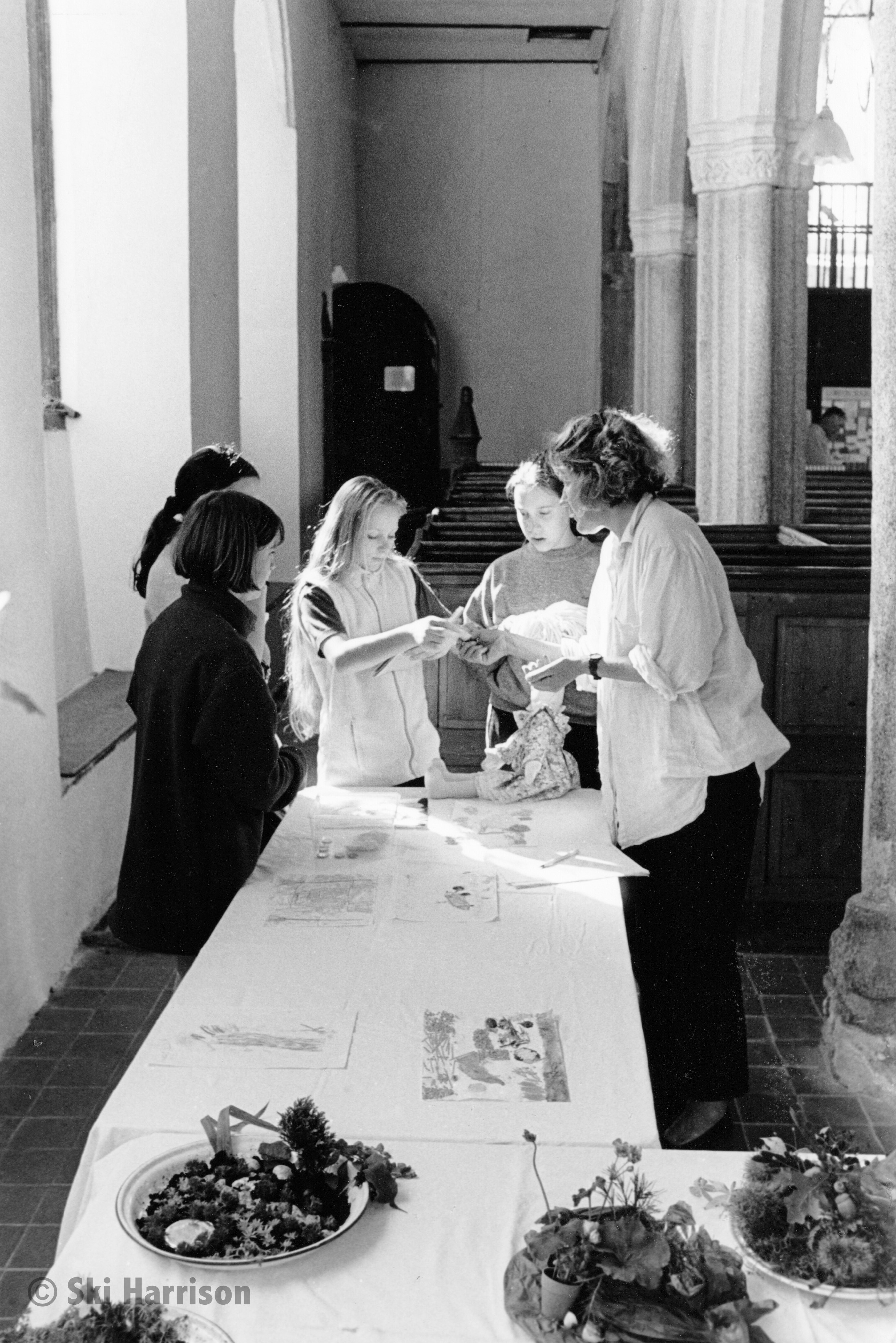 CS84 - Cornworthy Church Fete. Jane Porritt with children's exhibits of Gardens on a Plate. 1999